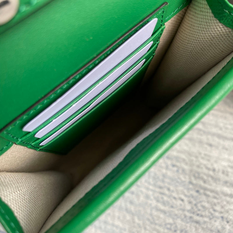Front view of polished elevated women's handbag – women's luxury handbag
