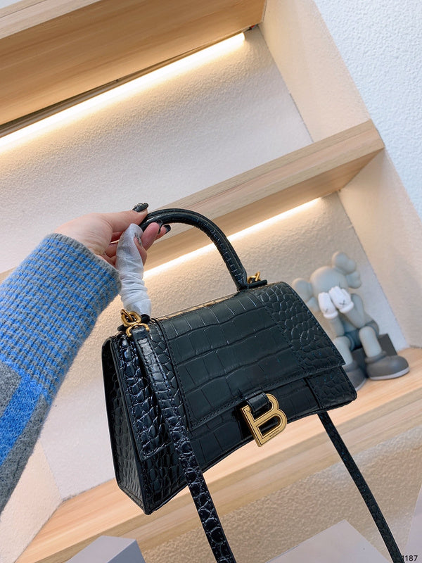 Ziva's Charm handbag – styled view (one versatile size)