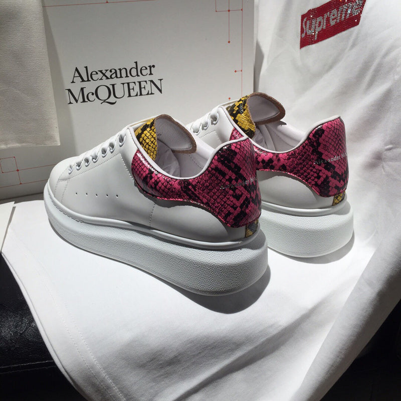 Alexander McQueen fresh white-and-black luxury sneakers view 8 signature lace-up style