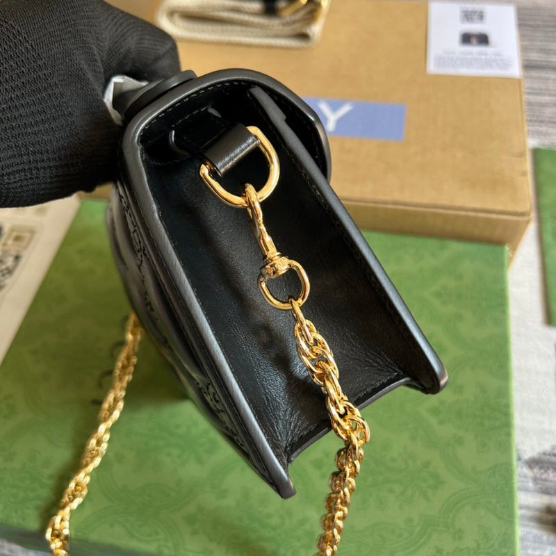 Side view of clean-lined structured handbag