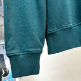 Back view of Louis Vuitton luxury clothing with everyday silhouette