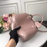 Front view of chic everyday-luxe women's handbag – women's designer-style accessory
