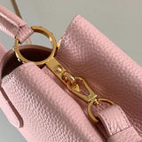 Handle and strap detail of modern statement women's handbag – women's luxury handbag