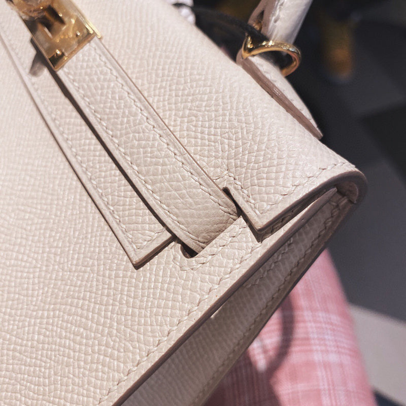 Side view of graceful structured handbag