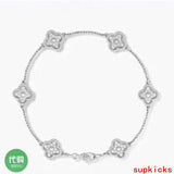Lifestyle view of Van Cleef & Arpels unisex jewelry piece