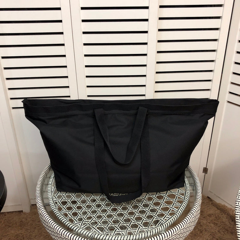Front view of elevated sleek women's handbag – women's luxury handbag