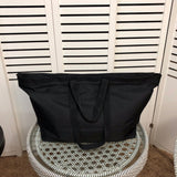 Front view of elevated sleek women's handbag – women's luxury handbag