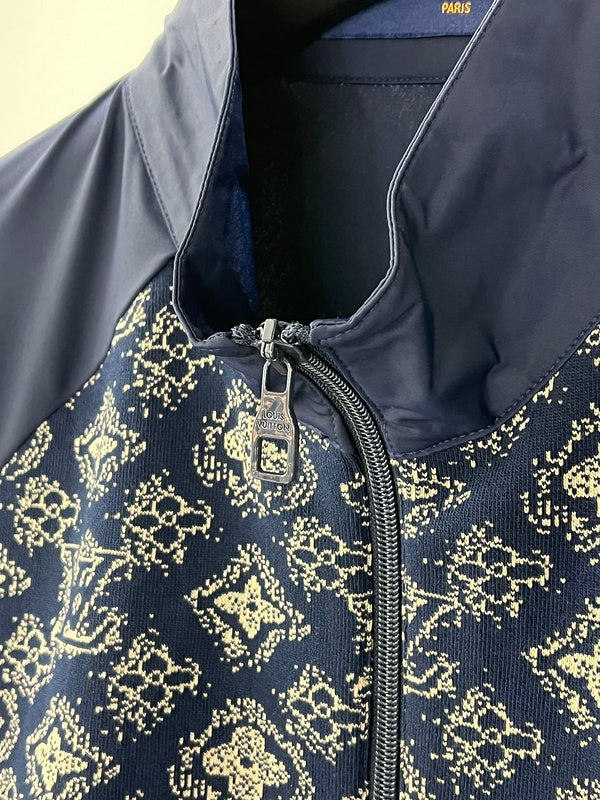 Close-up detail shot of Louis Vuitton luxury clothing with label-forward styling