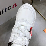 Louis Vuitton White Block Heel Pumps - Angled View