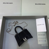 Sleek Premium PU Leather Handbag - Signature Hardware Accents | Women's Everyday Carry Handbag #483 - side angle view (image 2) of designer-inspired handbag