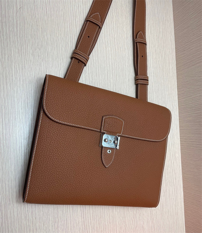  refined top-handle bag styled with outfit 12