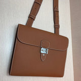  refined top-handle bag styled with outfit 12