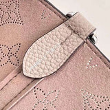 Side profile of chic polished women's handbag – women's luxury handbag