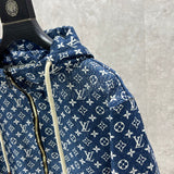 Full styled look of Louis Vuitton luxury clothing with label-forward styling