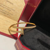 Close-up detail view of Cartier unisex jewelry piece