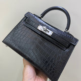 Side view of graceful structured handbag