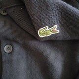 Full styled look of Lacoste luxury clothing with monogram-inspired silhouette