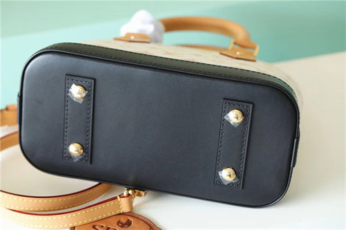  Chic top-handle bag carried on shoulder