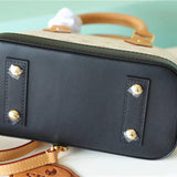  Chic top-handle bag carried on shoulder