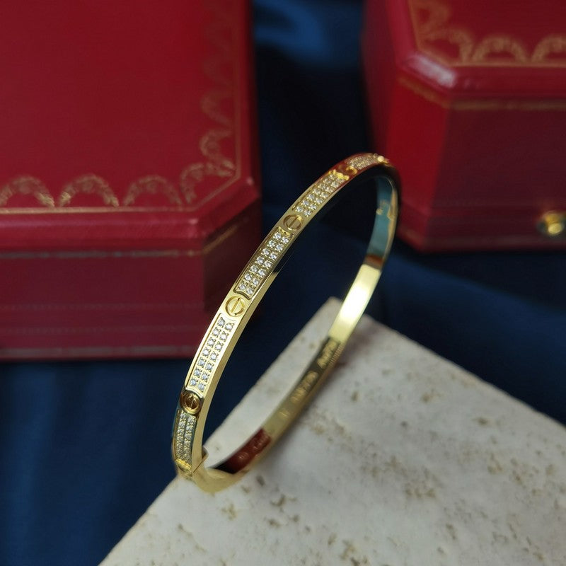 Side view of Cartier unisex jewelry piece