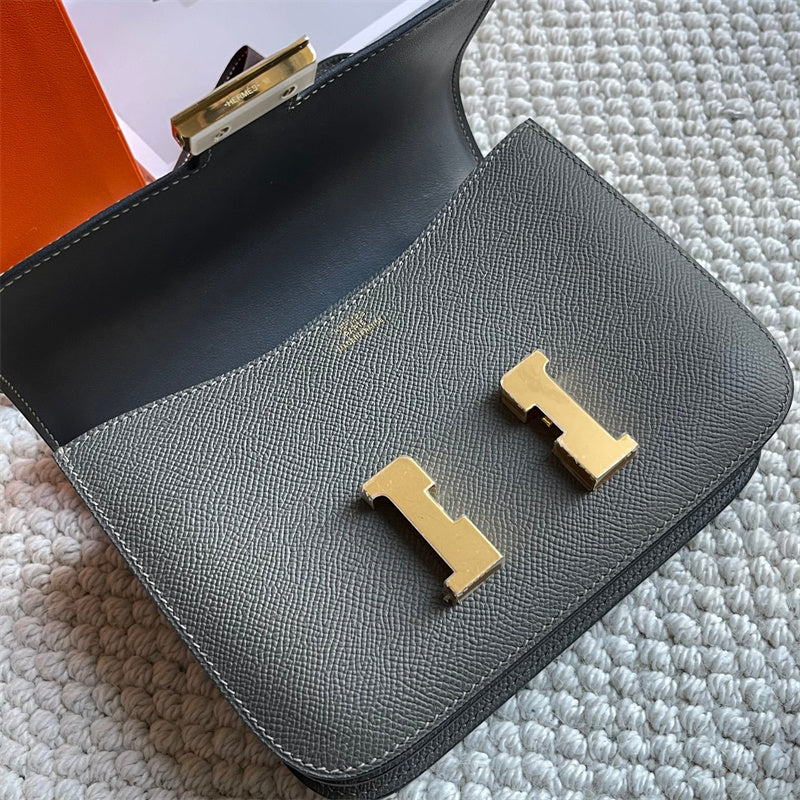 Side view of poised structured handbag
