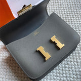 Side view of poised structured handbag