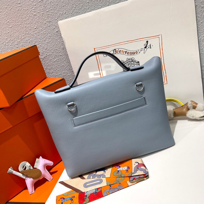 Side view of sculpted structured handbag