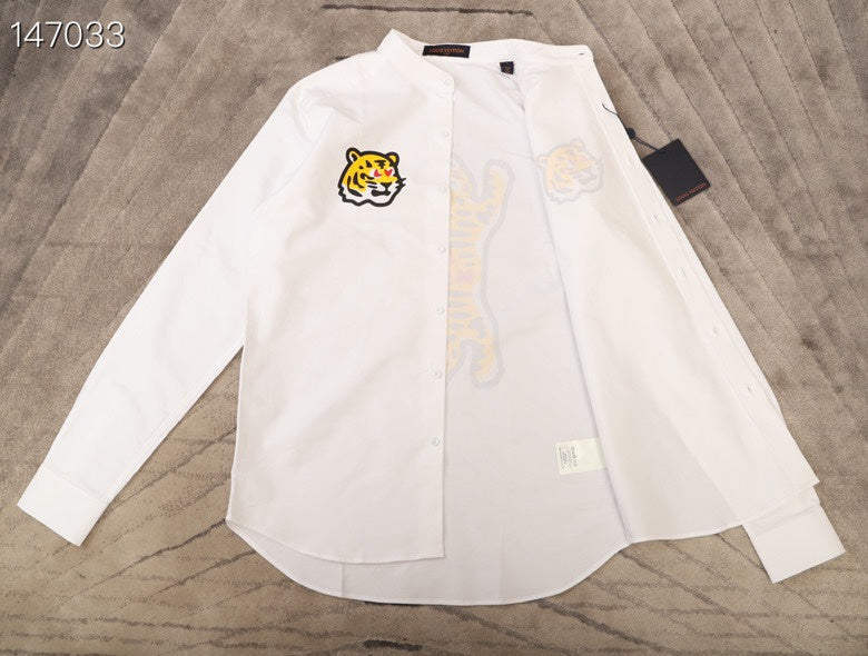Full styled look of Louis Vuitton luxury clothing with tailored silhouette