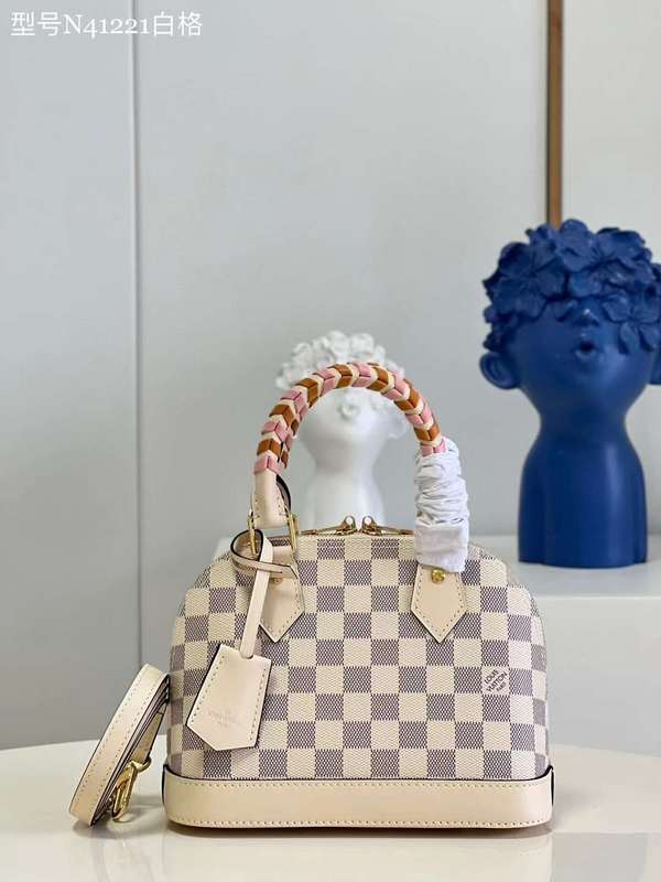Side profile of statement elevated women's handbag – women's statement bag
