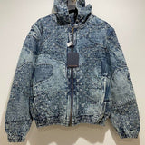 Full styled look of Louis Vuitton luxury clothing with signature branding
