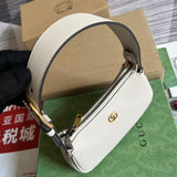 Handle and strap detail of modern elevated women's handbag – women's luxury accessory