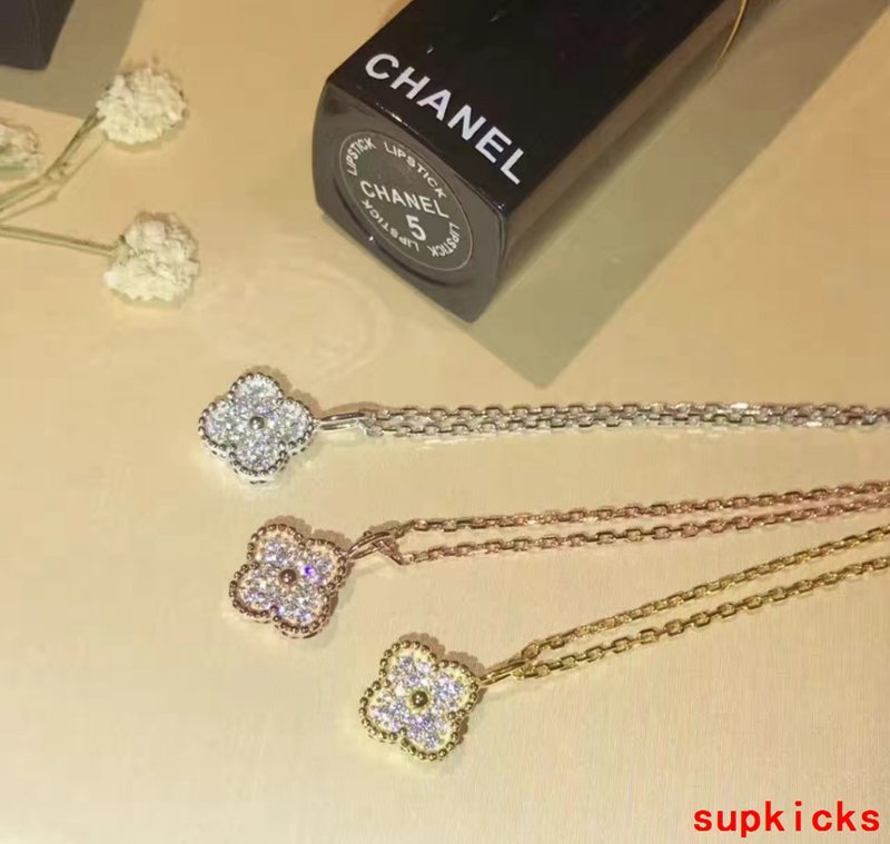 Lifestyle view of Van Cleef & Arpels unisex jewelry piece