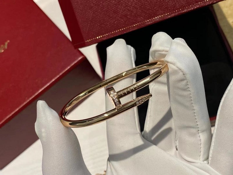 Front view of Cartier unisex jewelry piece