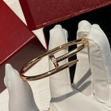Front view of Cartier unisex jewelry piece