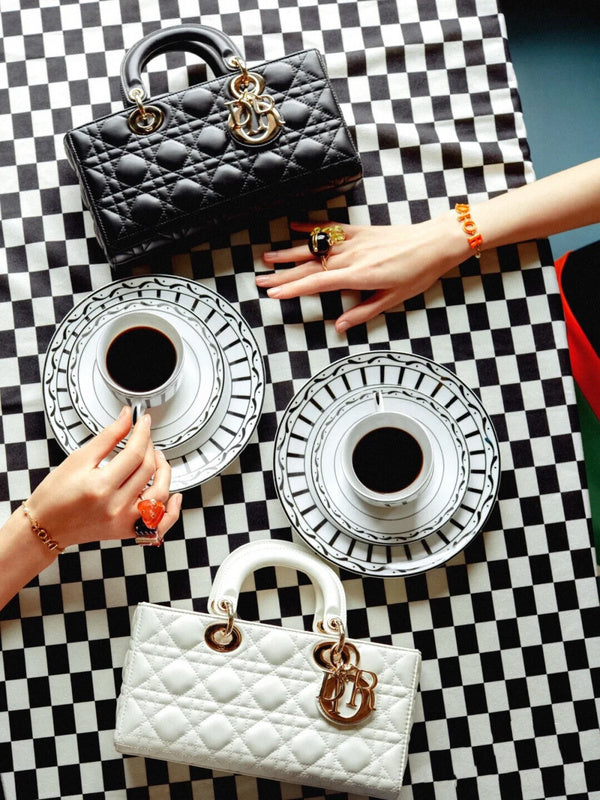 Side profile of elevated modern women's handbag – women's luxury accessory