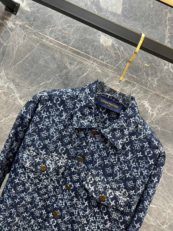 Close-up detail shot of Louis Vuitton luxury clothing with logo-detail design