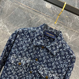 Close-up detail shot of Louis Vuitton luxury clothing with logo-detail design