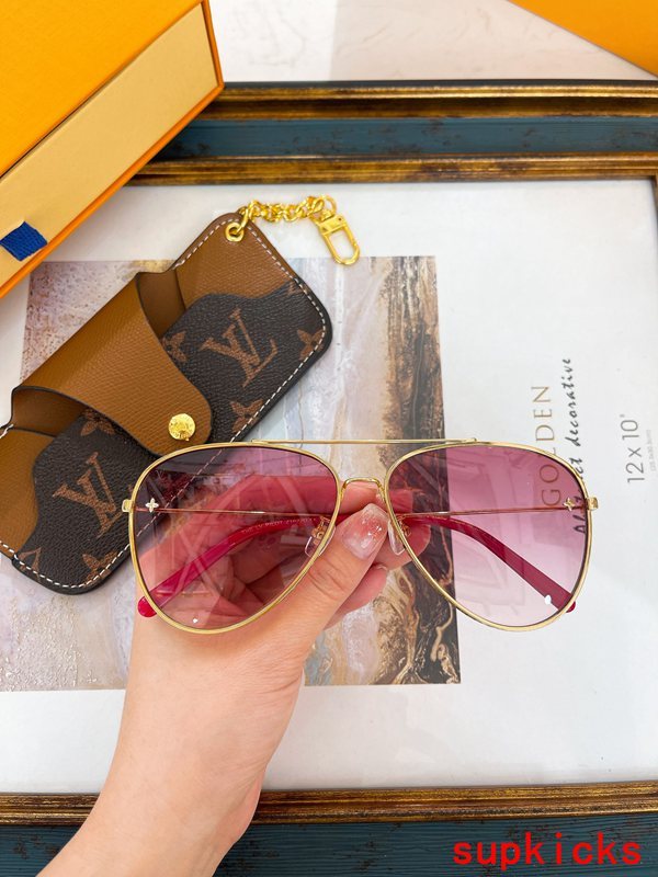Close-up detail view of Louis Vuitton unisex sunglasses