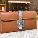 Side view of fluid structured handbag