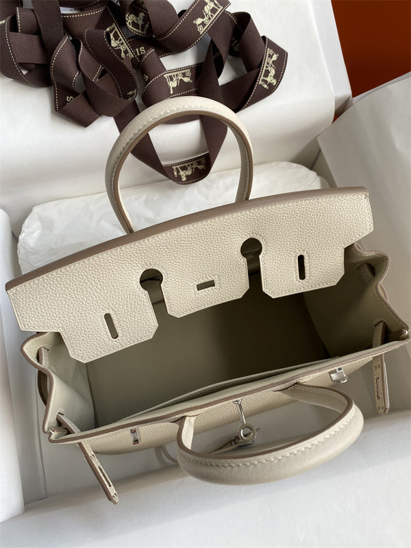 Side view of minimalist structured handbag