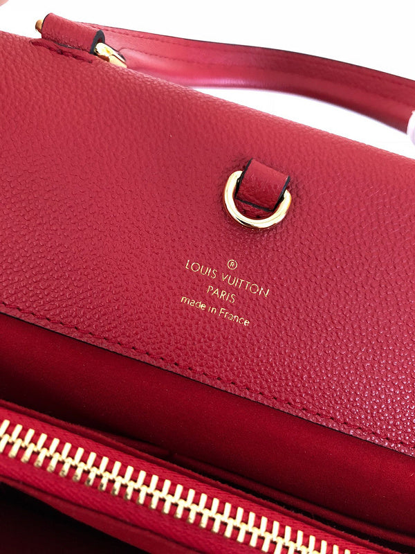 Side profile of classic elevated women's handbag – women's statement bag