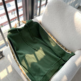 Full styled look of Gucci luxury clothing with logo-detail design