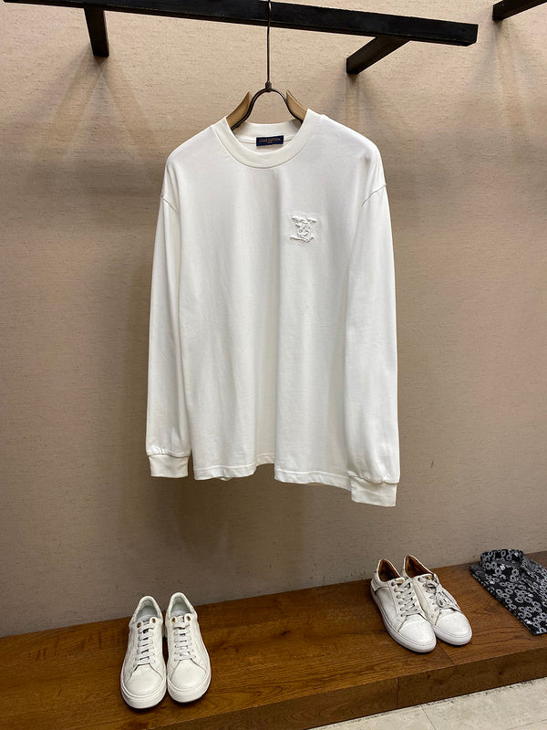 Front view of Louis Vuitton luxury clothing with runway-inspired design