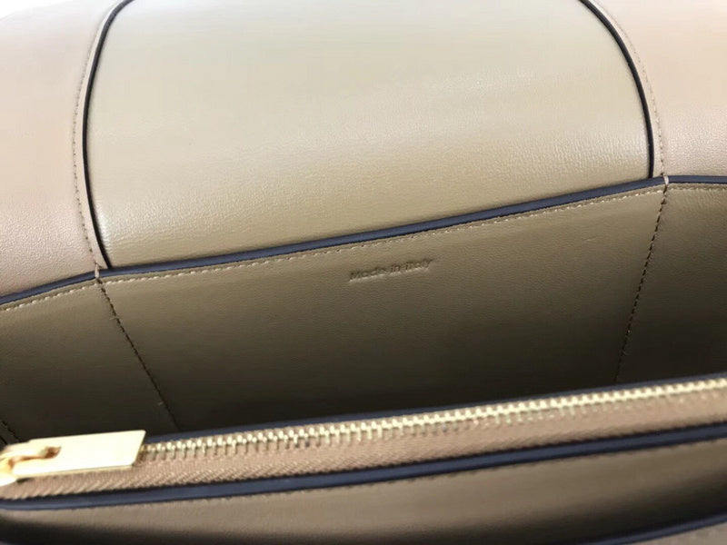Side profile of everyday-luxe signature women's handbag – women's designer-style accessory