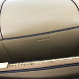 Side profile of everyday-luxe signature women's handbag – women's designer-style accessory