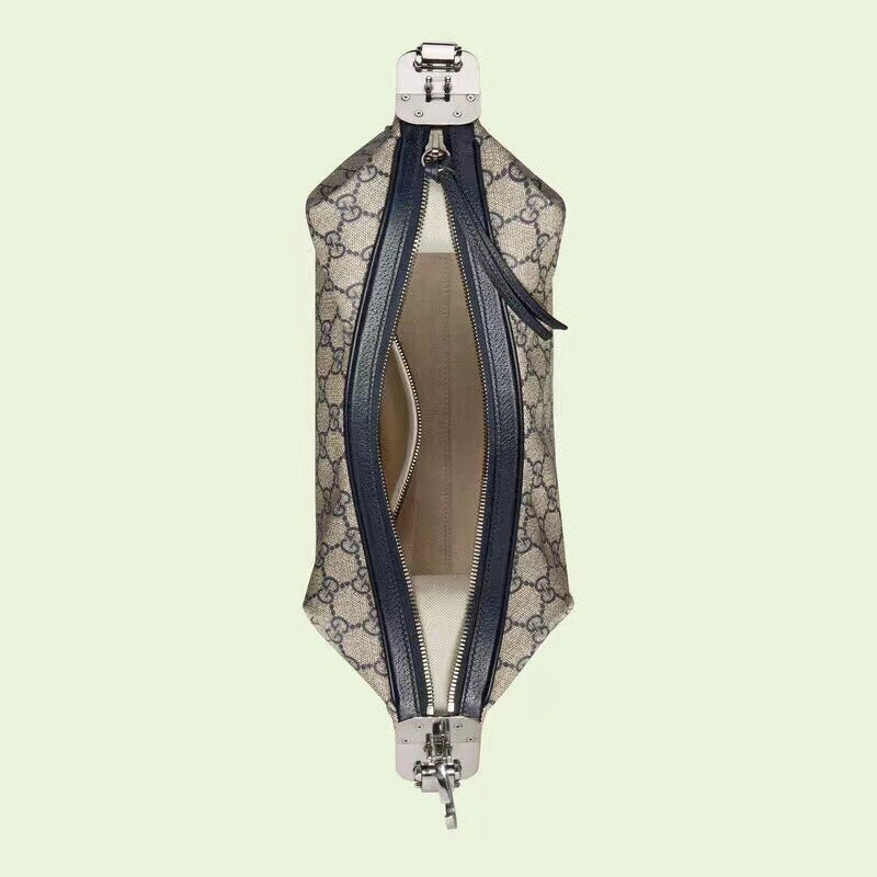 Side profile of elevated signature women's handbag – women's designer-style accessory