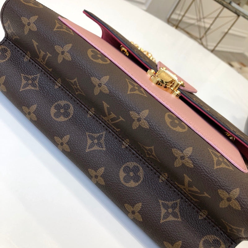Styled lifestyle shot of premium polished women's handbag – women's luxury handbag