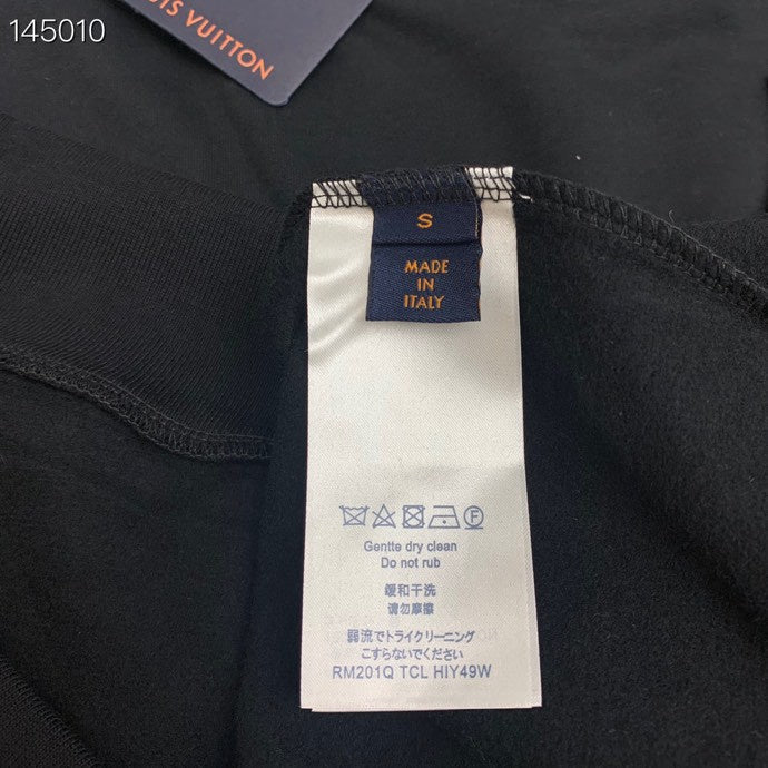 Close-up detail shot of Louis Vuitton luxury clothing with contemporary cut