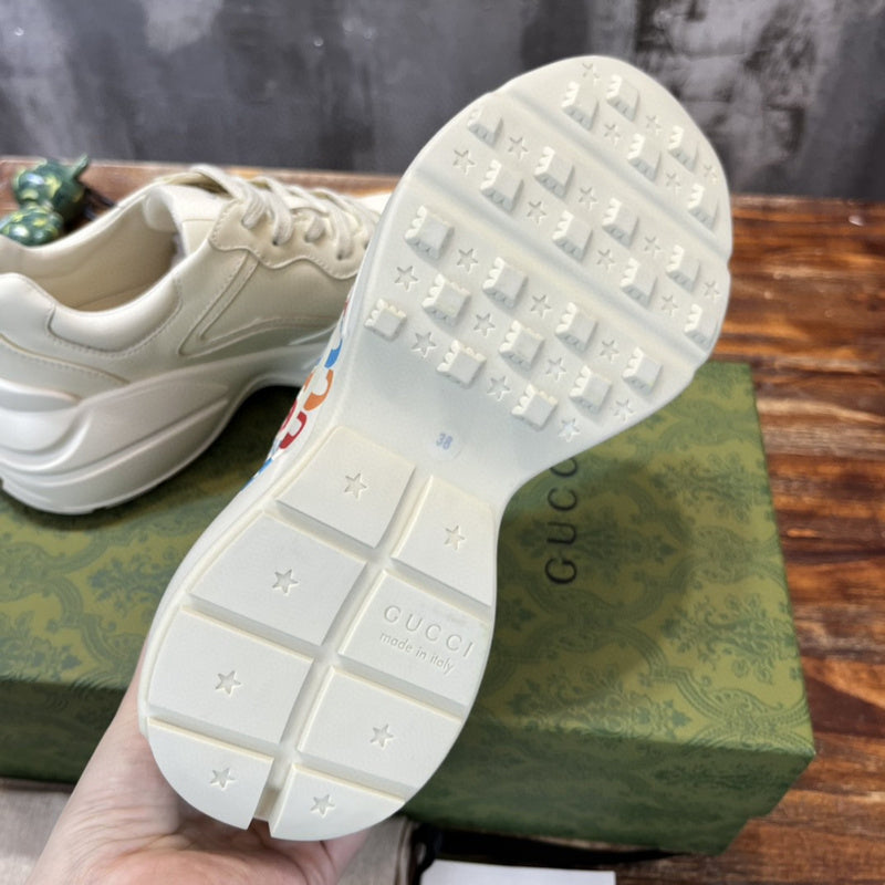 Side profile of Gucci tonal black sneakers bold athletic profile