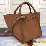 Styled lifestyle shot of chic statement women's handbag – women's statement bag